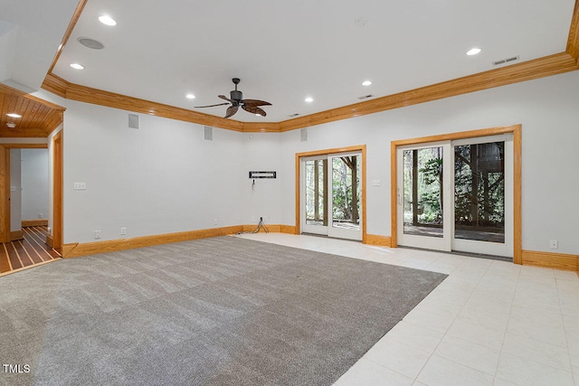 spare room with ornamental molding and ceiling fan