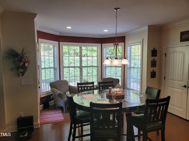 dining room with dark wood-type flooring, recessed lighting, crown molding, and baseboards