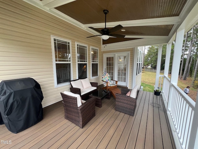 deck featuring an outdoor hangout area, a grill, and ceiling fan