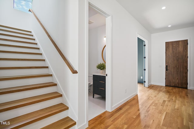 713 N State St, Raleigh, NC 27604 - stairway featuring wood finished floors and recessed lighting