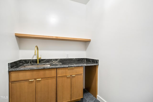 713 N State St, Raleigh, NC 27604 - indoor wet bar featuring dark tile patterned flooring