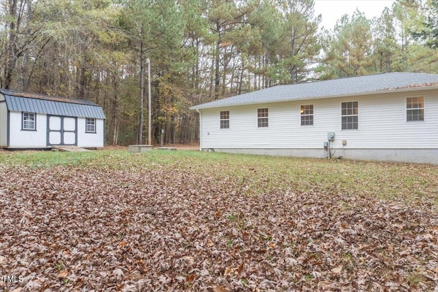 exterior space featuring a storage unit