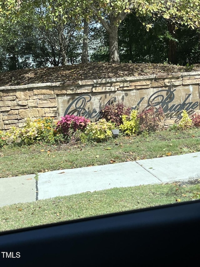 view of community sign