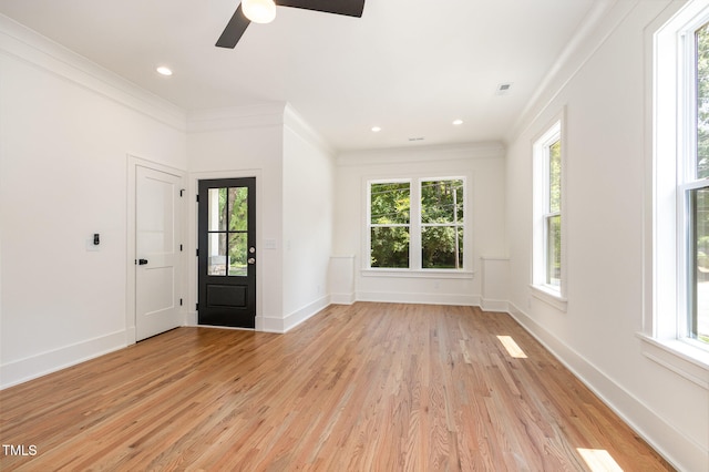 unfurnished room featuring light hardwood / wood-style flooring and ornamental molding