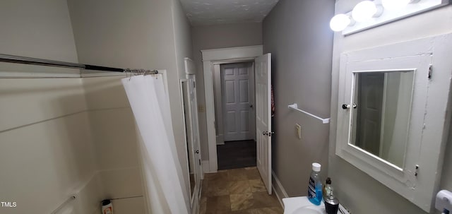 bathroom featuring curtained shower