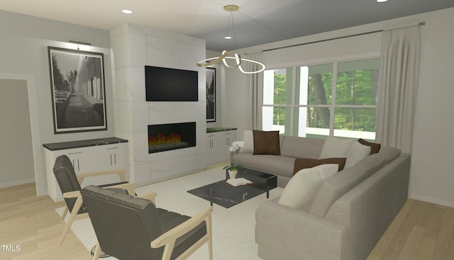 living room featuring a tiled fireplace and light wood-type flooring