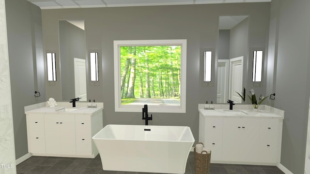 bathroom featuring vanity and a tub