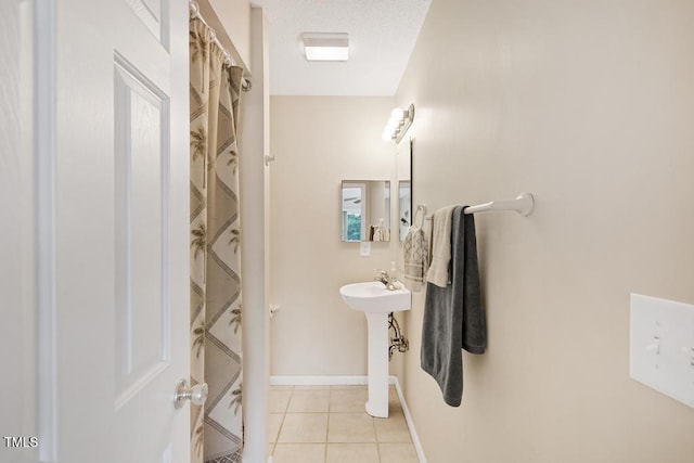 bathroom with tile patterned flooring