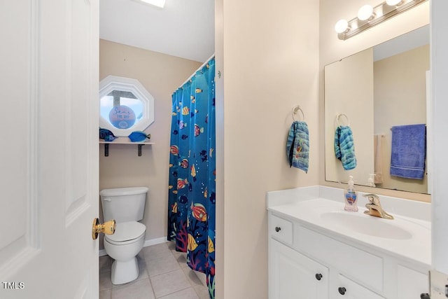 bathroom with toilet, vanity, tile patterned floors, and a shower with shower curtain