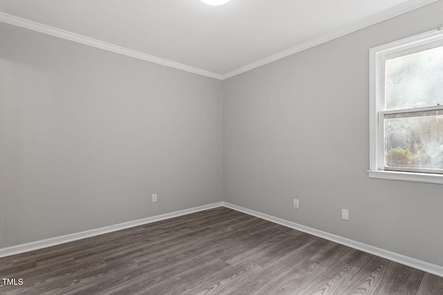 unfurnished room featuring crown molding and dark hardwood / wood-style flooring