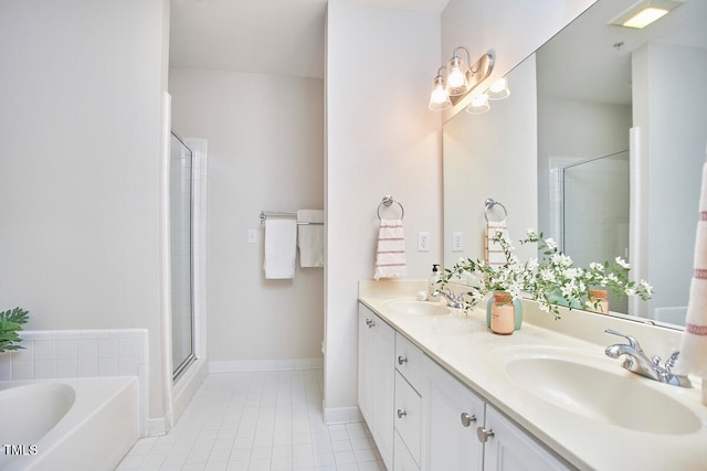 bathroom featuring tile patterned flooring, vanity, and independent shower and bath