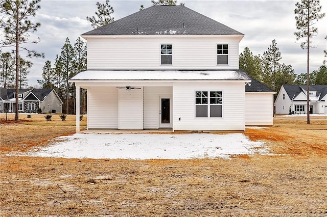 back of house with ceiling fan