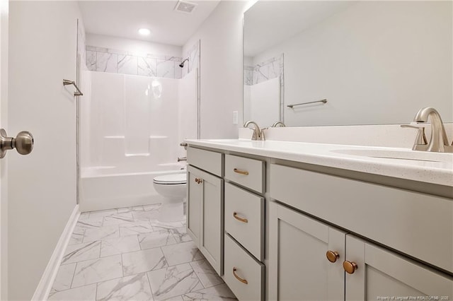 full bathroom featuring vanity, bathing tub / shower combination, and toilet