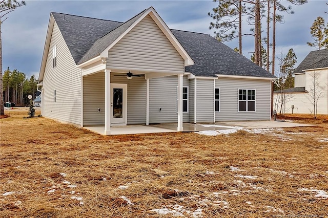 rear view of property with a patio area and ceiling fan