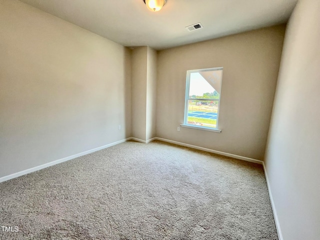 unfurnished room featuring carpet floors