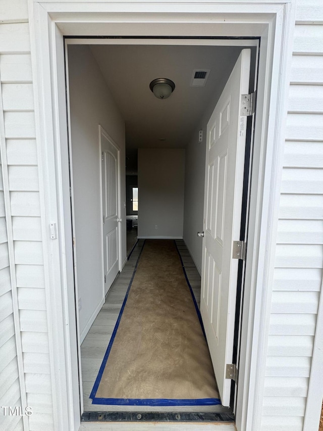 hall featuring hardwood / wood-style floors