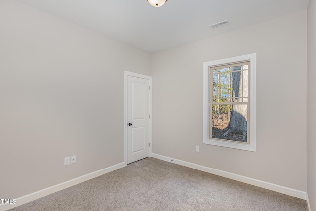 view of carpeted spare room