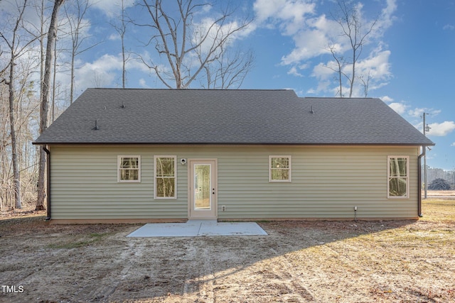 rear view of house featuring a patio