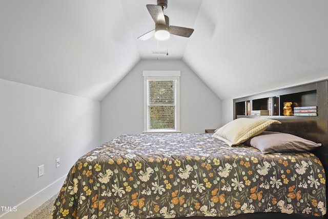 carpeted bedroom featuring vaulted ceiling and ceiling fan