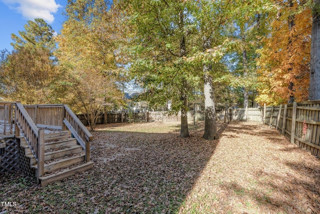 1608 Irving Pl, Creedmoor, NC 27522 - fenced backyard with stairs and a deck