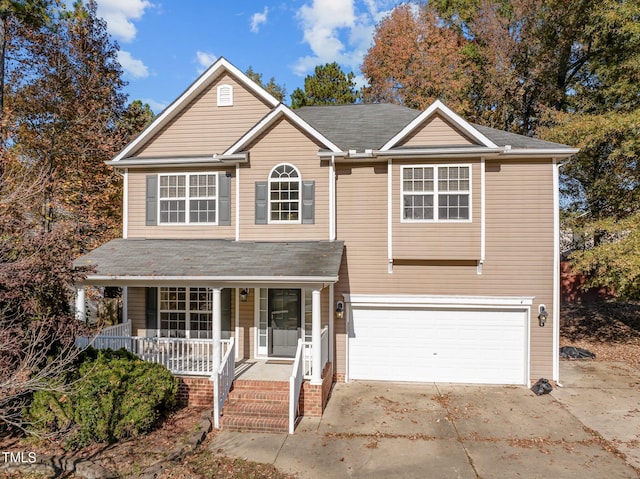 front facade with a porch and a garage