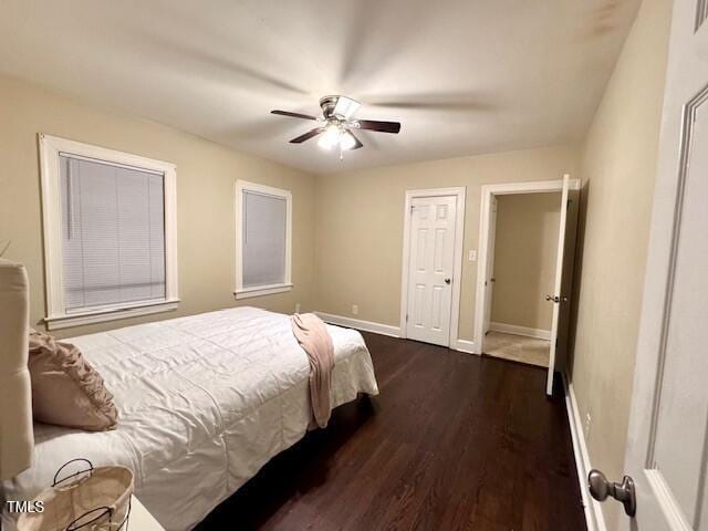 bedroom featuring dark wood-type flooring and ceiling fan