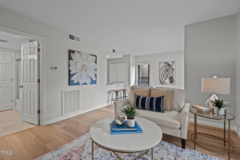 living room with wood-type flooring