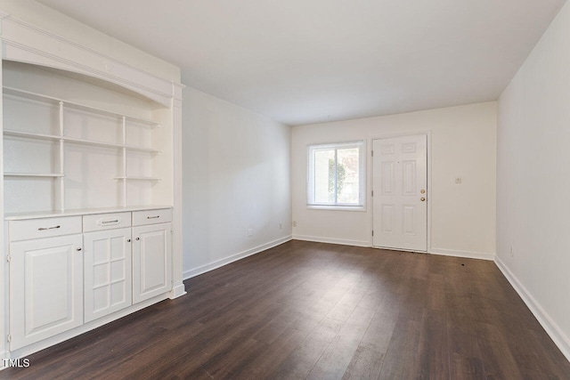 interior space with dark wood-type flooring