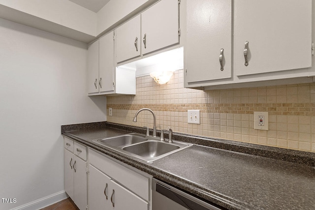 kitchen featuring white cabinetry, decorative backsplash, sink, and dishwasher