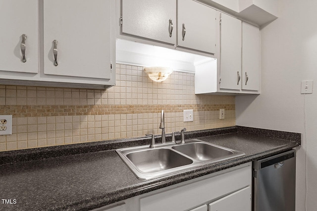 kitchen with white cabinets, dishwasher, sink, and backsplash