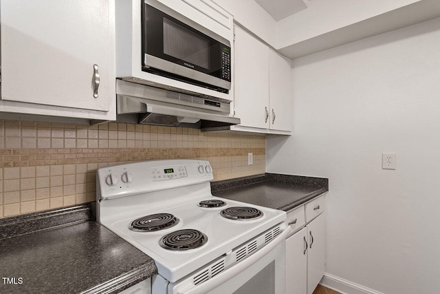 kitchen featuring exhaust hood, backsplash, stainless steel microwave, white cabinetry, and white electric stove