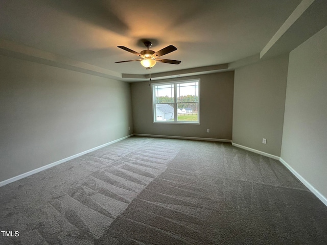 unfurnished room featuring carpet flooring and ceiling fan