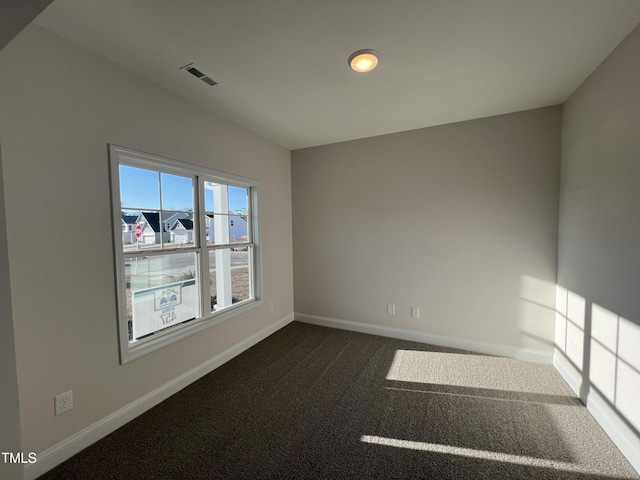 view of carpeted spare room