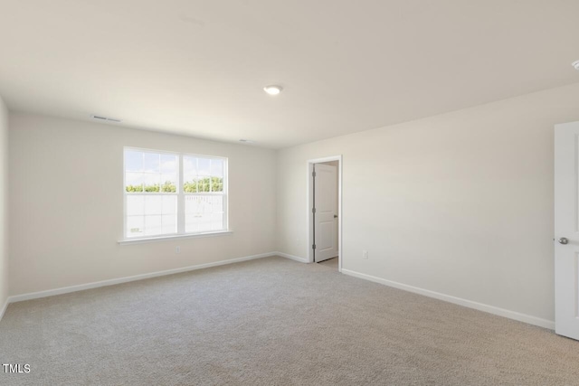 view of carpeted spare room