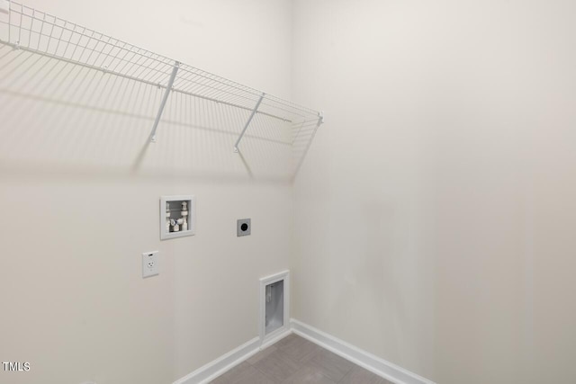 laundry area featuring hookup for an electric dryer and hookup for a washing machine