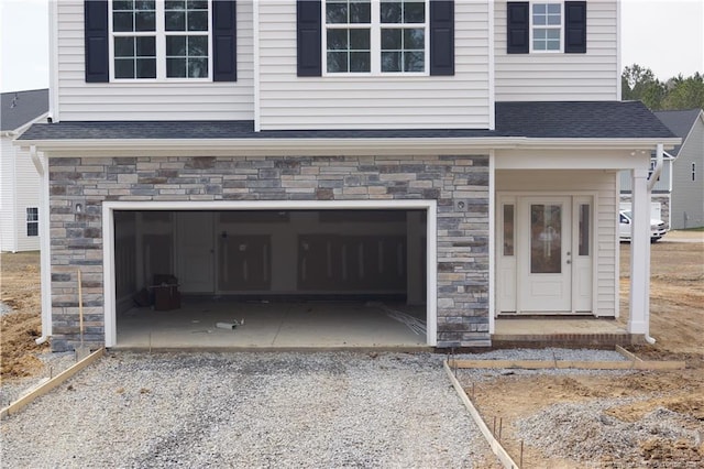 garage featuring driveway