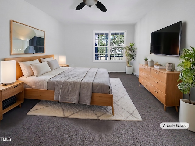 carpeted bedroom with ceiling fan