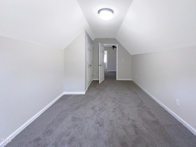 bonus room with ceiling fan, carpet, and lofted ceiling