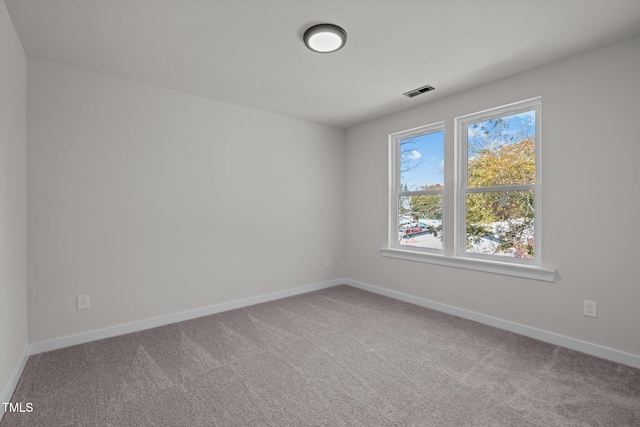 empty room featuring carpet