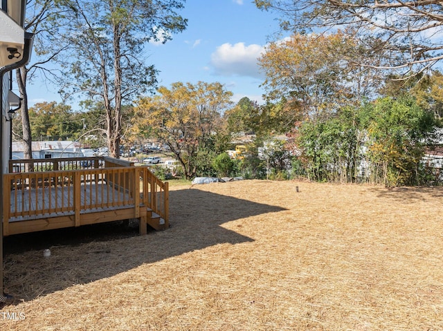 view of yard with a deck