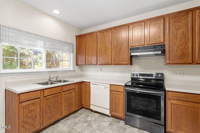 kitchen with sink, a textured ceiling, dishwasher, and stainless steel electric range oven