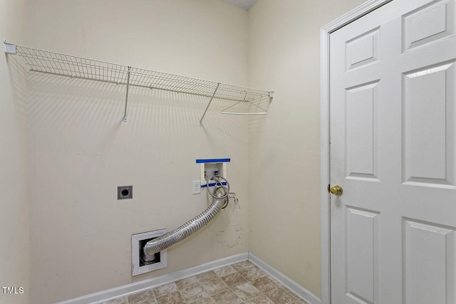 clothes washing area with electric dryer hookup and washer hookup