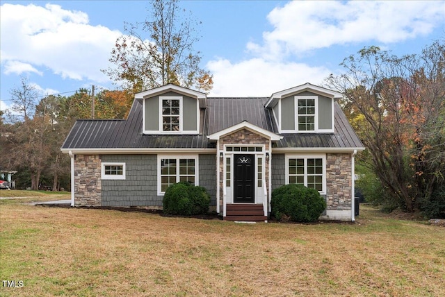 view of front of property with a front lawn