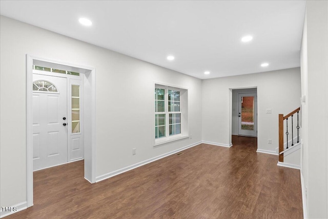 unfurnished room featuring dark hardwood / wood-style floors