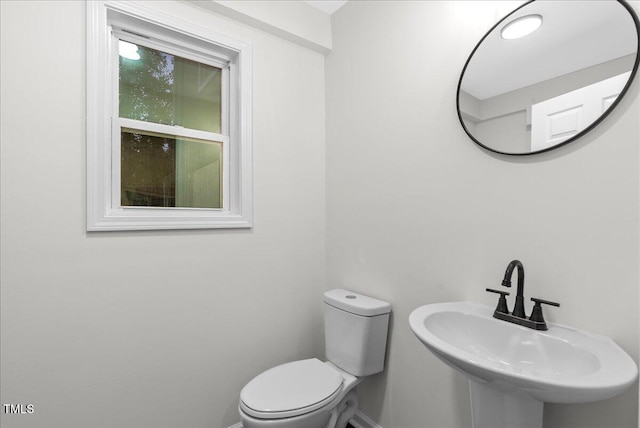 bathroom with sink and toilet