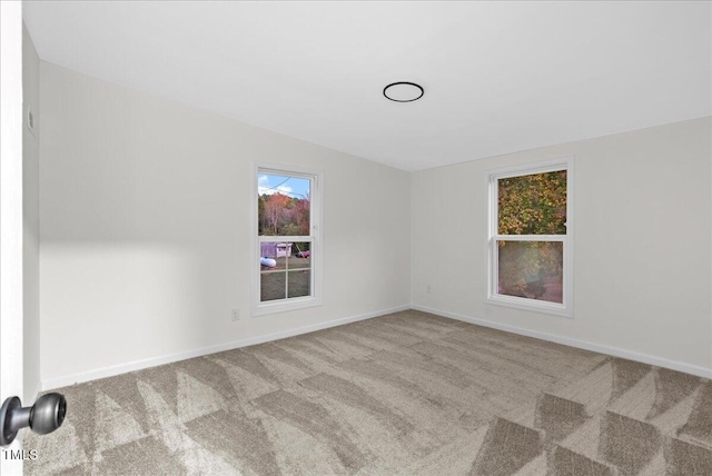 view of carpeted spare room