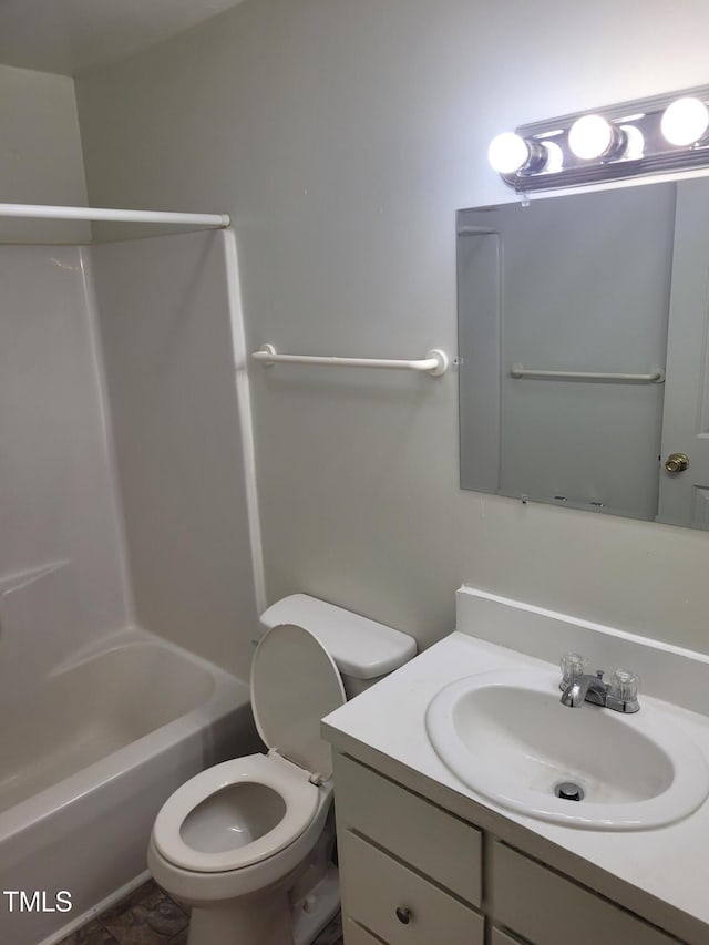 full bathroom featuring vanity, toilet, and shower / washtub combination