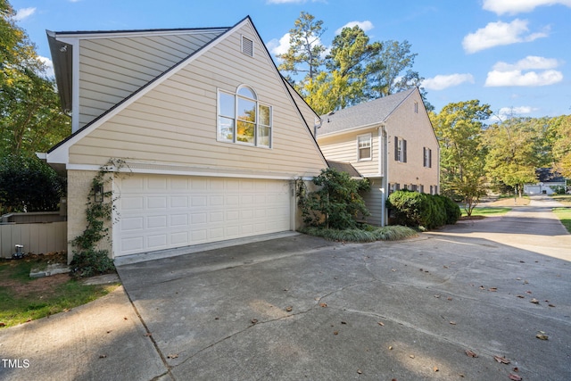 view of home's exterior with a garage