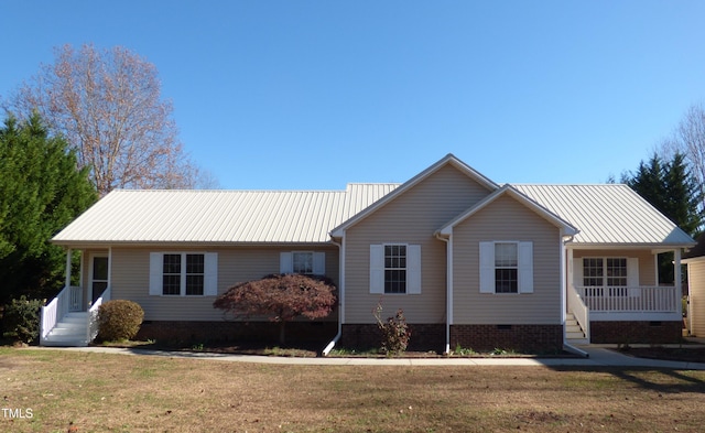 single story home featuring a porch and a front lawn