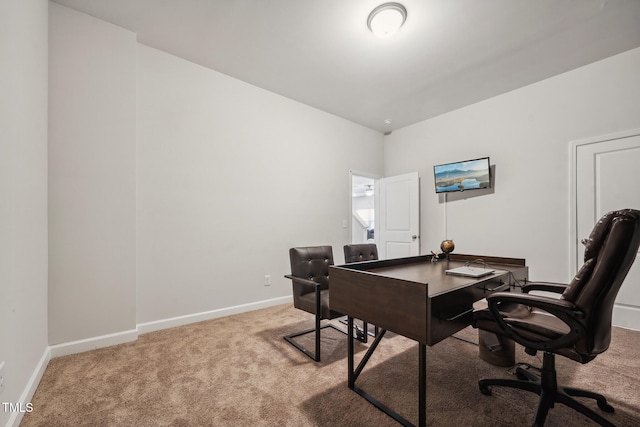 office area featuring light colored carpet